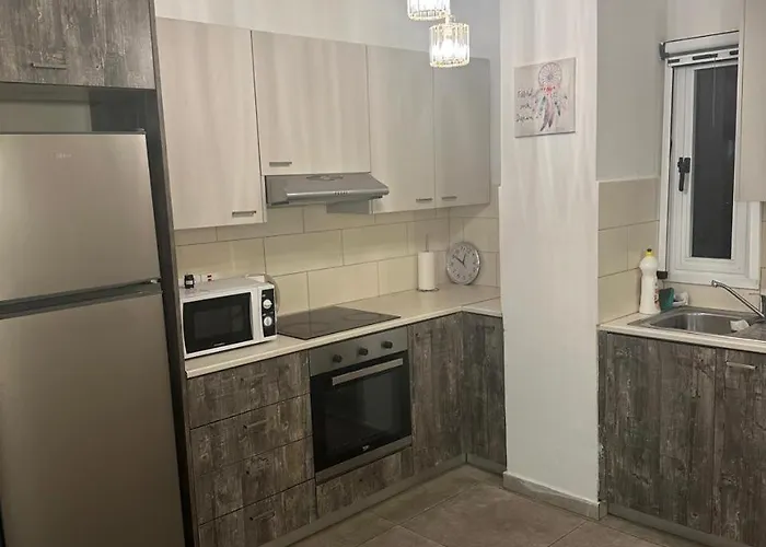 Near Finikoudes 15 Апартаменты *